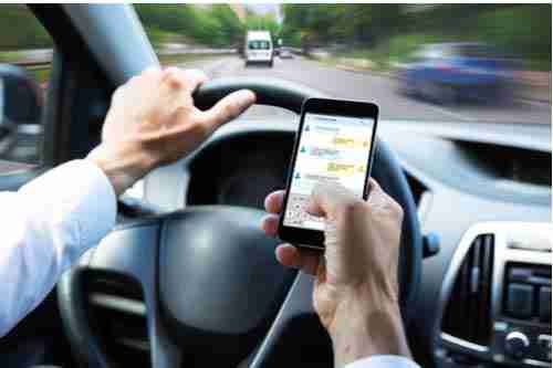 Decatur texting and driving accident lawyer concept, man texting and driving
