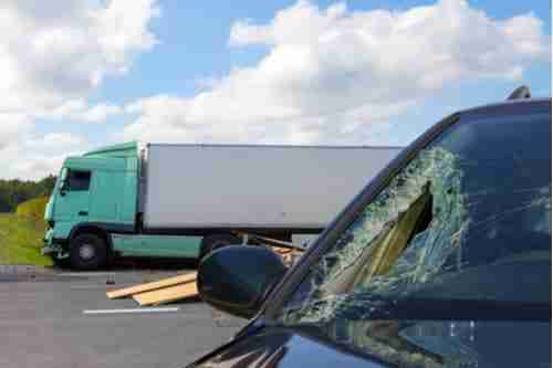 Car hit by commercial truck, concept of Decatur truck accident lawyer