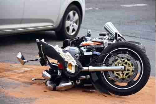 Motorcycle hit by car, concept of Scottdale motorcycle accident lawyer
