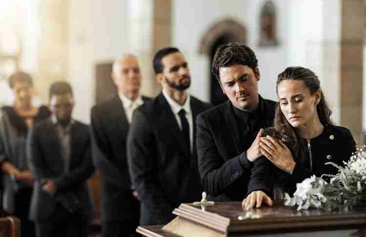family morning at a funeral after wrongful death